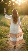 Back of bohemian beauty showing peace sign